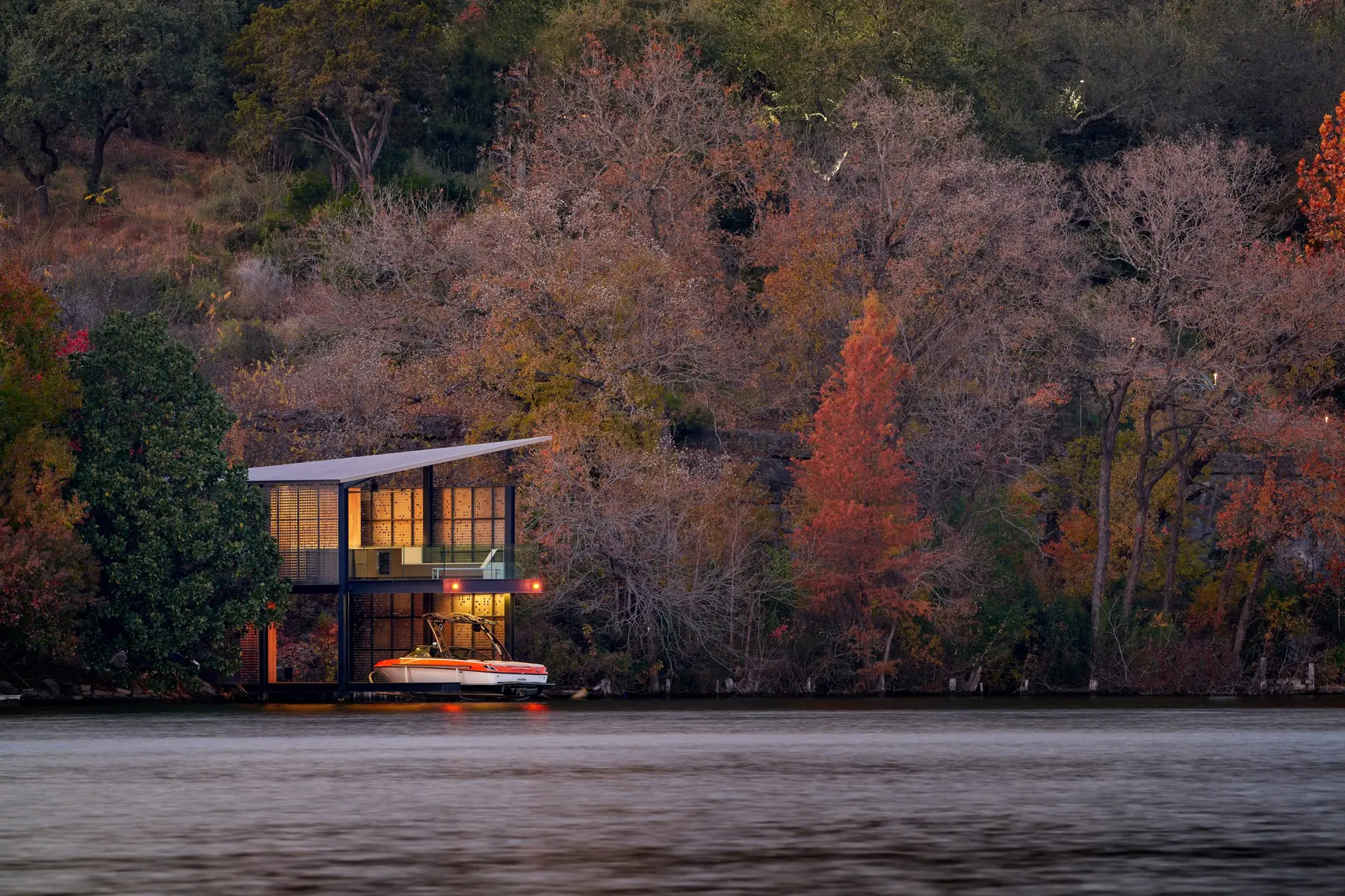 Filtered Frame Dock by Risinger Build, glowing over the water at dusk