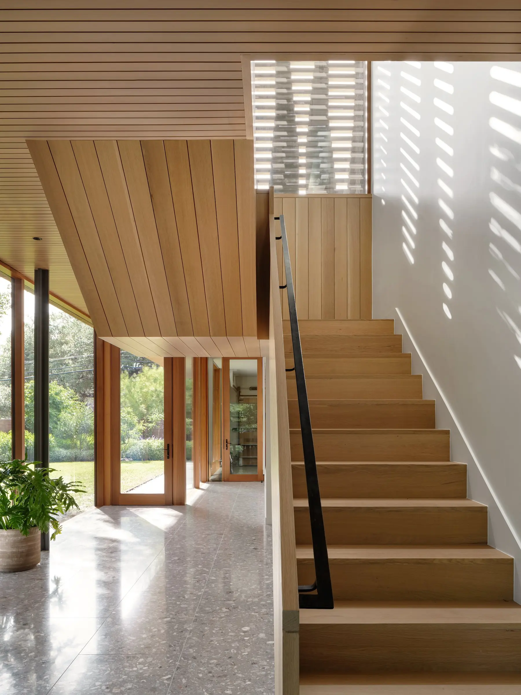 Stair at bottom, Greenbelt Residence by Risinger Build, Austin, TX