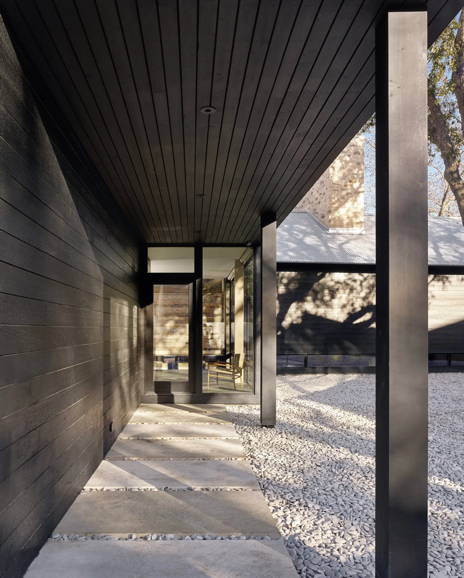 Entry walk at Modern Texas Prefab, a Risinger Build home in the Austin hills