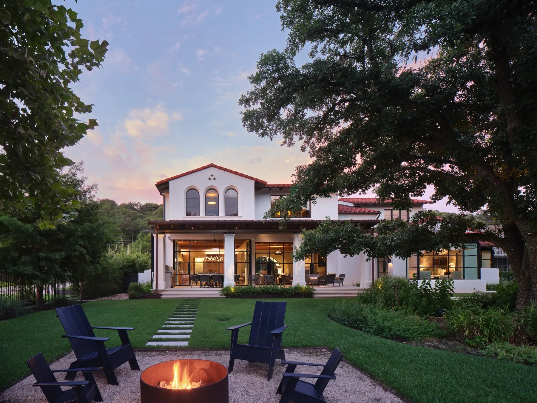 Exterior back with fire pit, Tortuga by Risinger Build, Austin, TX
